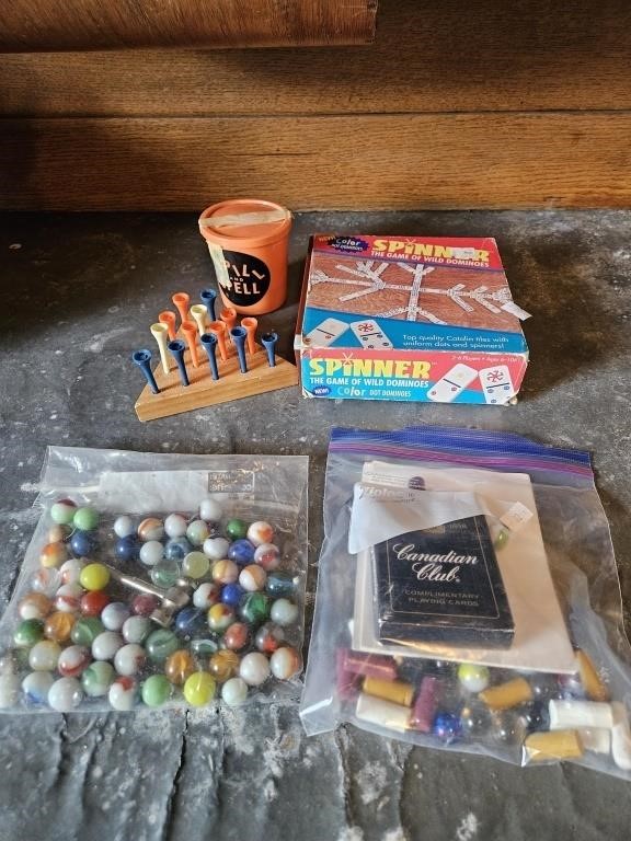 Game lot with marbles, playing cards, peg game,