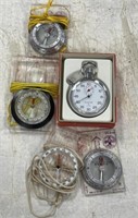 Stopwatch and Camp Compasses