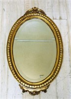 Gilt Wood Framed Oval Beveled Mirror.