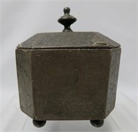 Cast iron tobacco box on brass ball feet,