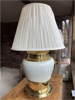 Urn design brass and antique white table lamp