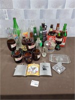Vintage pop and beer bottles, beer glasses,etc