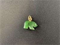 Standing bear charm made from Alaskan Kobuk jade.