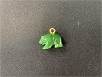 Standing bear charm made from Alaskan Kobuk jade.