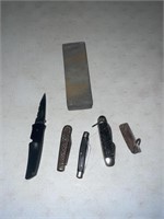 5 knives, wet stone