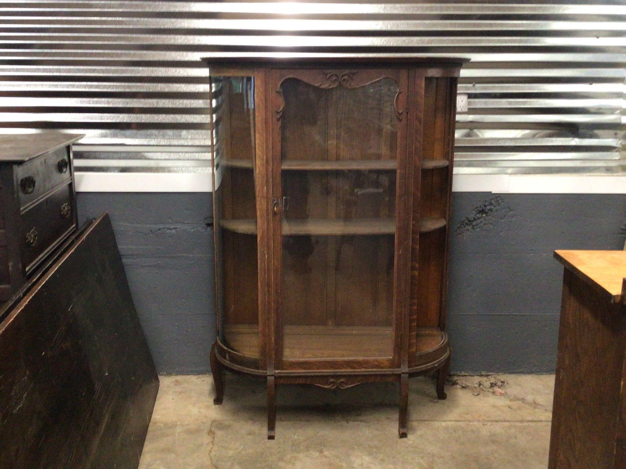 OAK CHINA CLOSET WITH BOW GLASS SIDES