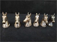 Set of six silver plated horsehead salt and