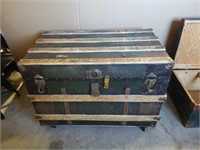 Old trunk on wheels