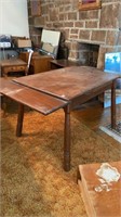 Wooden table with pull out extensions 11 inches