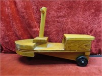 Vintage wooden Ride on toy boat.