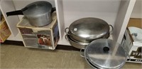 2 pressure cookers and pans