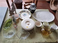 Glassware Plates and Other Items on the table.