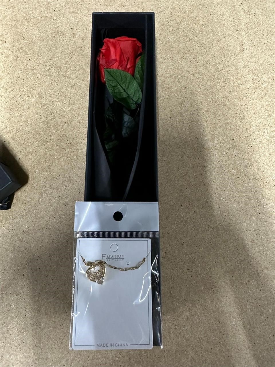 rose and necklace black box