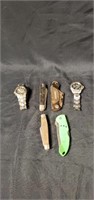 Two watches and four pocket knives
