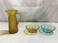 Amber pitcher, hand blown; teal, amber bowls