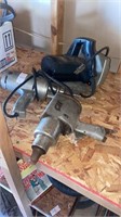 Three vintage power tools, electric drill,