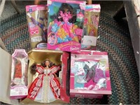 6 barbie dolls in box