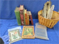 9 antique books -basket -feathers