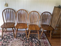 4 wooden dining chairs not all the same height