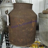 Milk bucket, rusted w/ holes in bottom