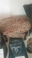 Animal print fabric covered footstool