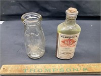 Milk bottle and sulphur compound