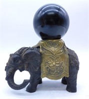 Natural Stone Sphere Resting on Figural Elephant.