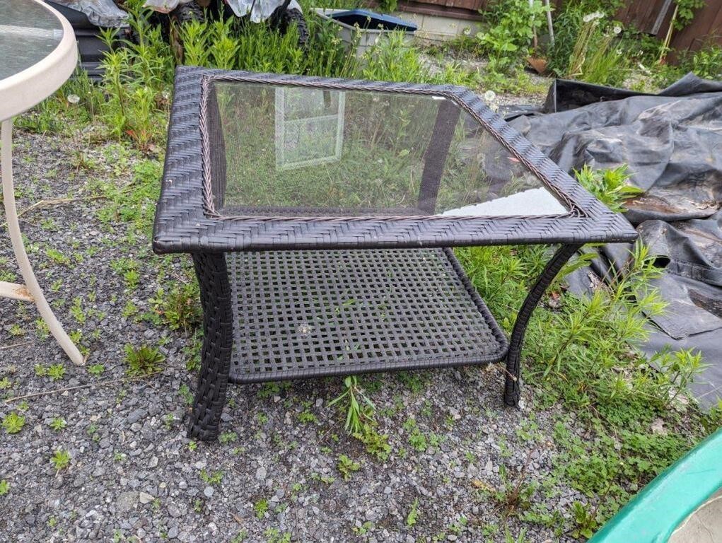 Glass top woven patio/coffee table