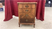 Very nice four drawer solid wood nightstand.