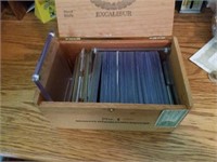 Box full of baseball card top loads and cases.