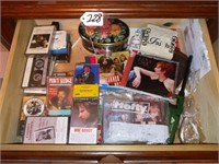 Drawer full of misc tapes and DVDs