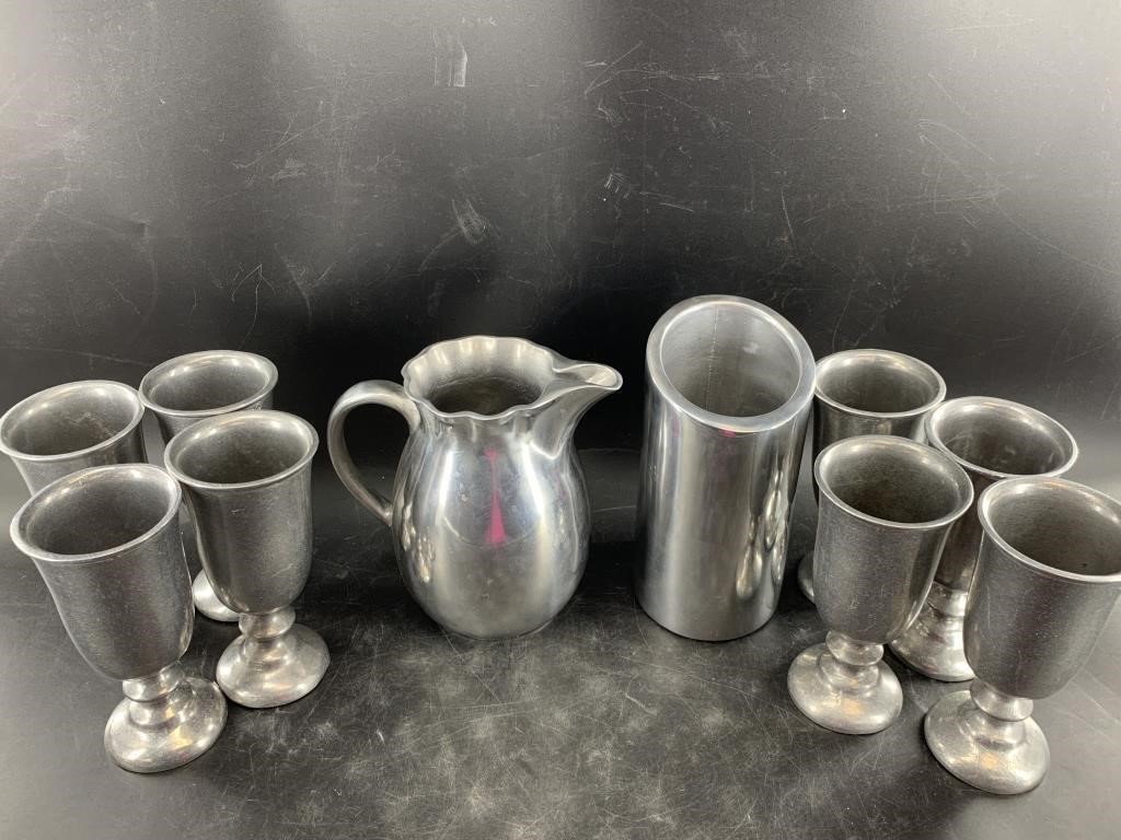 Lot of pewter goblets and pitcher and a vase