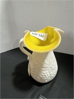 Yellow and white pitcher