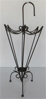 Metal umbrella holder. Measures: 27"H.