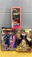 3 boxed Barbie dolls, Swiss, NASCAR and Happy