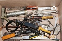 Large channel locks, small grease gun, wrenches