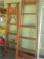 Two wooden step ladders