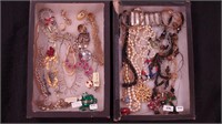 Two containers of costume jewelry: Trifari,