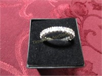 Sparkly ring - approx. size 9 - missing one stone