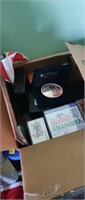 Box of cassettes cds Montana River belt buckle