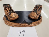 Antique bronze baby shoes