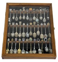 Collection of Vintage Souvenir Spoons in Display s