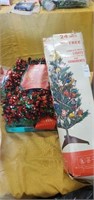 24 inch Christmas tree and lot of garland