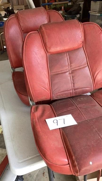 4/ red matching boat seats, one gray seat in a