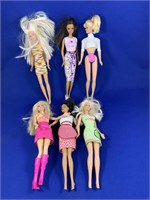 6 Early Barbie Dolls