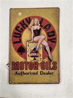 LUCKY LADY MOTOR OILS TIN SIGN-APPROX 12"TX8"W
