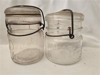 Lot of 2 vintage glass jars