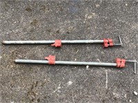 2 METAL PIPE CLAMPS