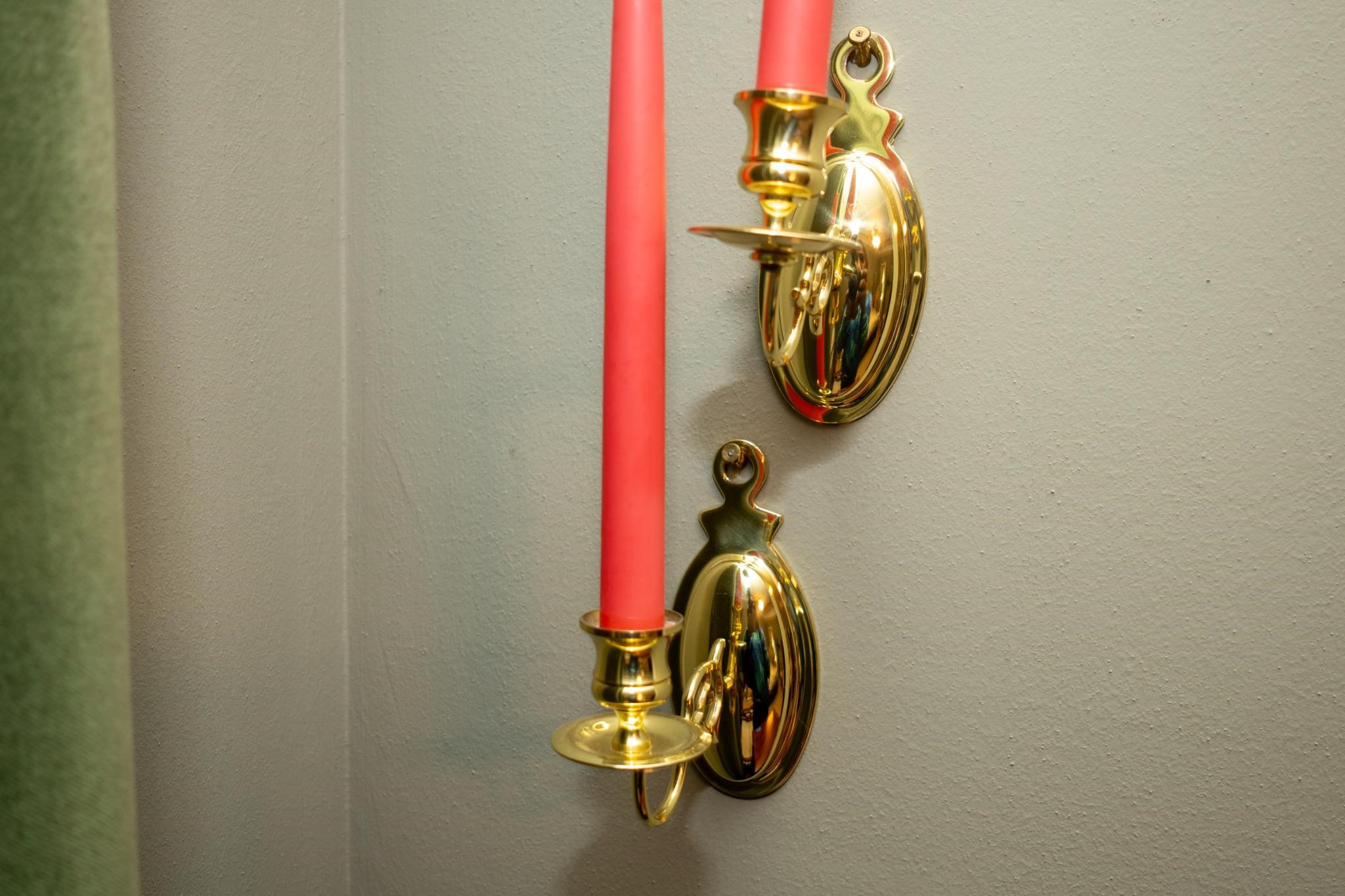 Pair of brass candle wall sconces