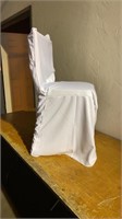 Five white cloth chair covers